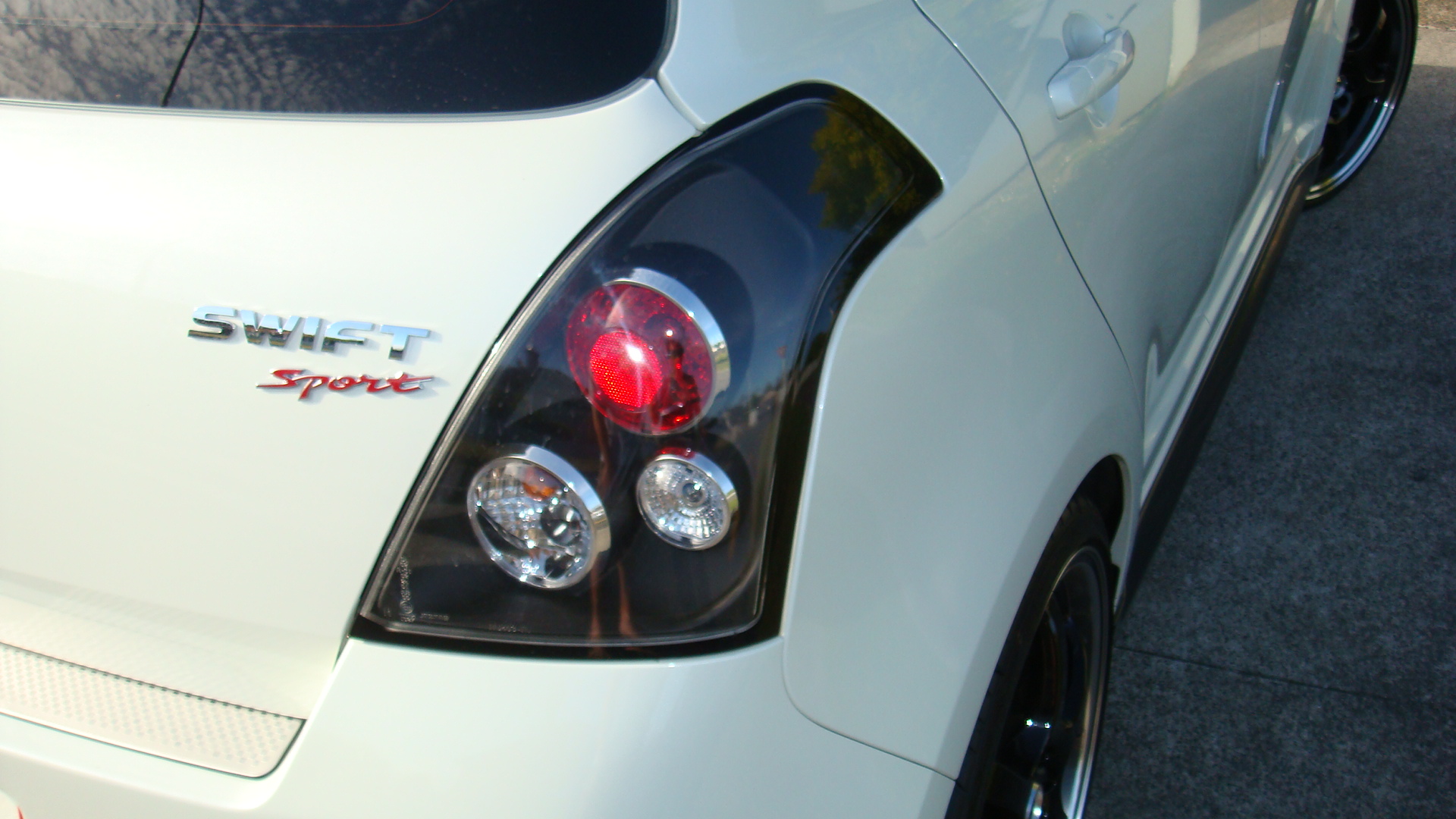 Black Altezza Tail Lights for 2004-2010 Suzuki Swift hatchback